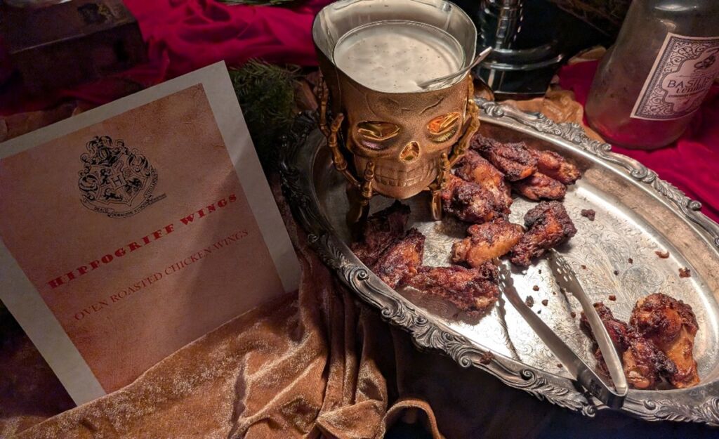 Platter of food labeled Hippogriff Wings